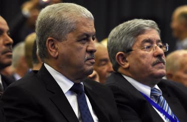 Algeria's Prime Minister Abdelmalek Sellal (L) and Rally for National Democracy (RND)'s interim secretary general, Ahmed Ouyahia, attend an extraordinary meeting of the RND on May 5, 2016, in the capital Algiers. (File photo)