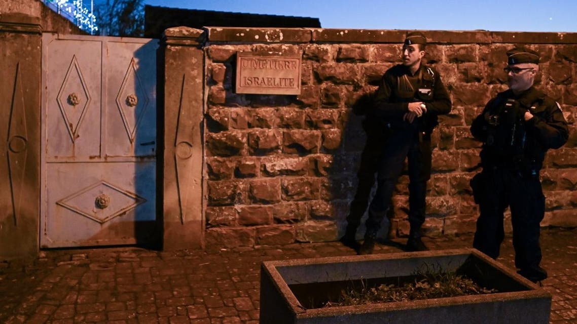 French gendarme stand guard at the jewish Westhoffen cemetery's entrance near Strasbourg, eastern France, on December 3, 2019. (AFP)