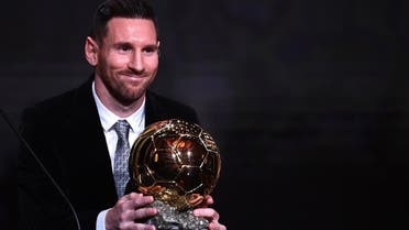 Barcelona’s Argentinian forward Lionel Messi reacts after winning the Ballon d’Or France Football 2019 trophy at the Chatelet Theatre in Paris on December 2, 2019. (AFP)