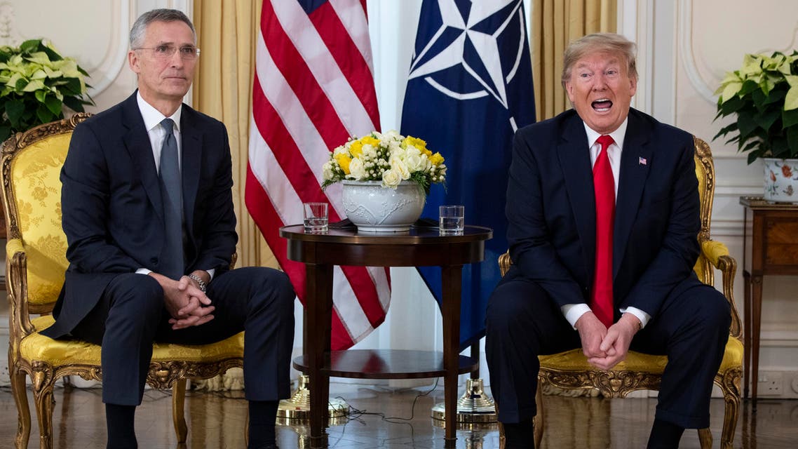 Stoltenberg with Trump at NATO 3-12-19 - AP