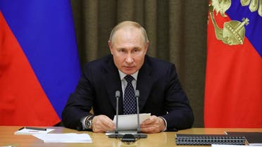 Russian President Vladimir Putin meets with top military officials in Sochi on December 3, 2019. (AFP)