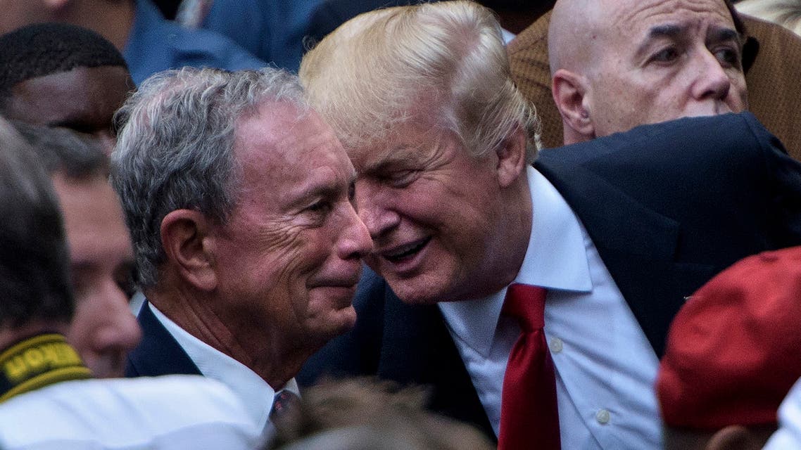 (FILES) In this file photo taken on September 11, 2016 US Republican presidential nominee Donald Trump speaks to former New York City Mayor Michael Bloomberg during a memorial service at the National 9/11 Memorial in New York. President Donald Trump's campaign said on December 2, 2019 it was banning journalists from Bloomberg News from its electoral events, claiming bias by the media group owned by presidential rival Michael Bloomberg.Brad Parscale, the Trump 2020 campaign manager, said the decision was made after Bloomberg News announced it would not investigate the company boss or his Democrat competitors.