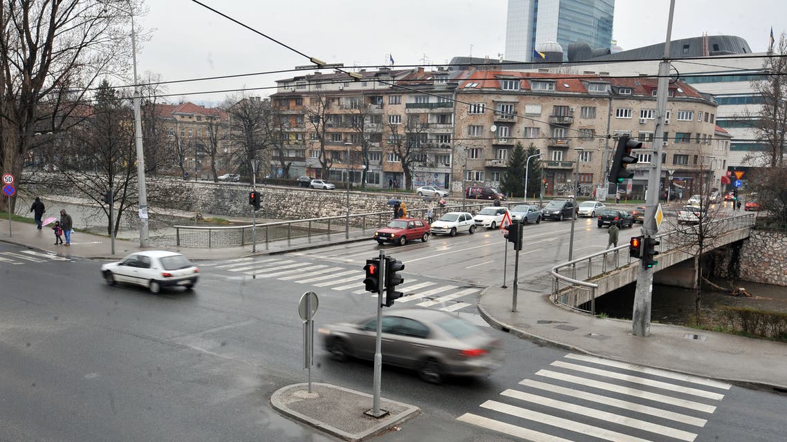 Cars drive on the bridge formerly called Vrbanja bridge, now called Bridge of Suada Dilberovic and Olga Sucic, on March 19, 2019, in Sarajevo. Bridge Vrbanja is the location where first civilian victims fell due to fire from Bosnian Serb positons in April 1992. The first victims were a young Bosnian Muslim woman Suada Dilberovic and her friend, a Bosnian Serb woman, Olga Sucic.