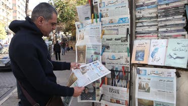 Man reads the last edition of al-mustaqbal, on January 31, 2019, before it went out of print, in Beirut. (Reuters)