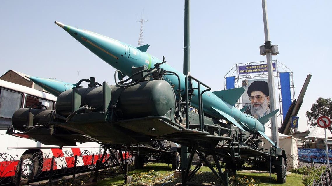 Two Iranian Sayyad-1 surface-to-air missiles (L) and a Zelzal missile (R background) are displayed, 26 September 2007, in front of a large portrait of Iran's Supreme Leader Ayatollah Ali Khamenei. (File photo: AFP)
