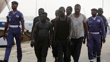 Nigerian pirates under arrest by Nigerian servicemen in 2016 - AP