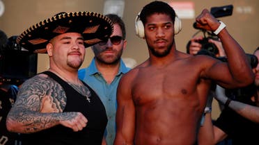 Andy Ruiz Jr and Anthony Joshua during the weigh-in at the Al Faisaliah Hotel, Diriyah, Saudi Arabia, on December 6, 2019. (Reuters) 