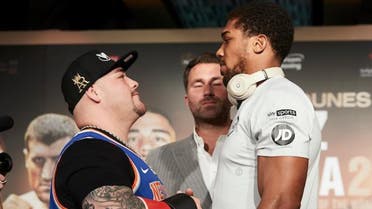 Andy Ruiz and Anthony Joshua face off during the press conference on December 4, 2019. (Supplied)