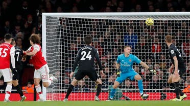 Brighton’s Neal Maupay (2nd left), scores his sides second goal past Arsenal’s goalkeeper Bernd Leno (2nd right), during their English Premier League soccer match at the Emirates Stadium in London on December 5, 2019. (AP)