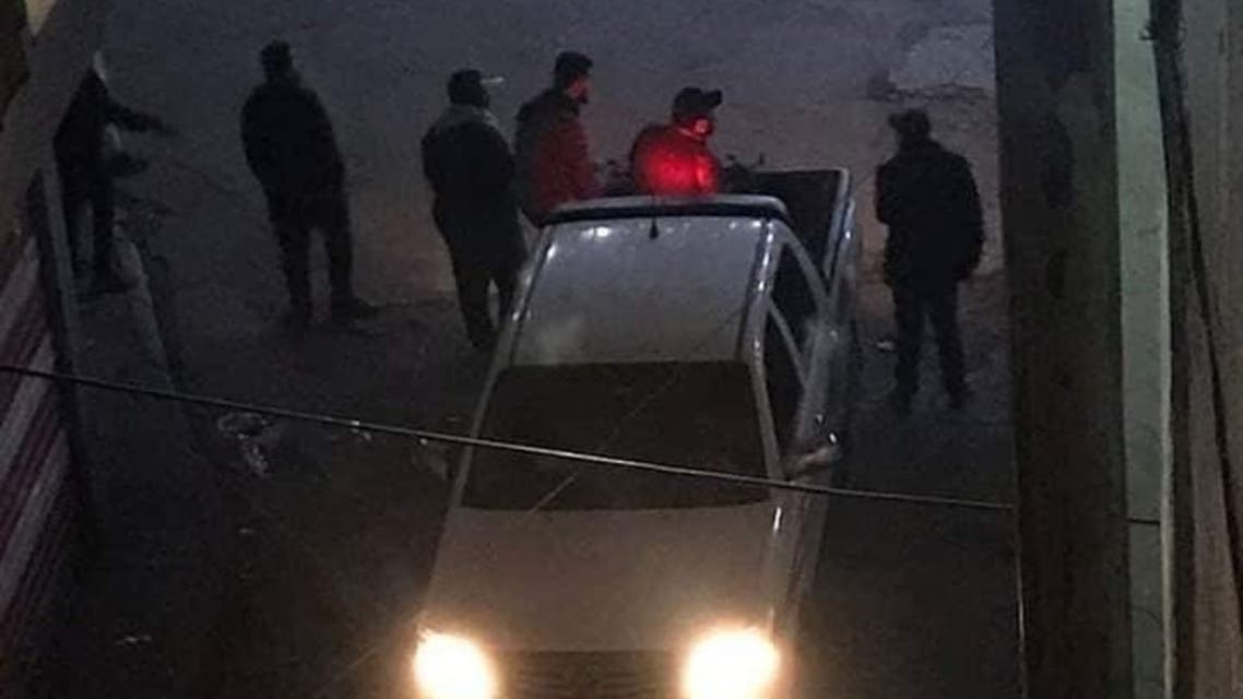 مسلحون بزي مدني يطلقون النار على المتظاهرين في بغداد