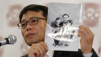 Son of North Korea hijack victim demands return of father