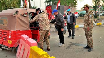 Checkpoints with ‘Blue Hats’ unarmed militia set up to protect Iraqi protesters