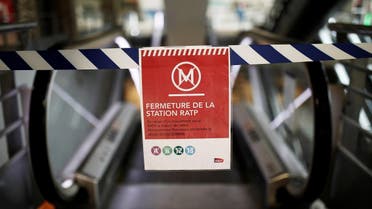 A sign reading metro lines closed is seen at Gare Montparnasse train station as a strike by French SNCF railway and Paris transport network (RATP) workers continues against French government's pensions reform plans. (Reuters)