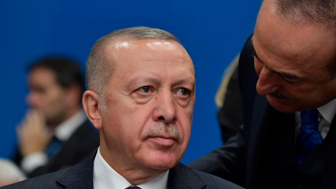 Turkey's President Recep Tayyip Erdogan attends the plenary session of the NATO summit at the Grove hotel in Watford, northeast of London on December 4, 2019. (AFP)