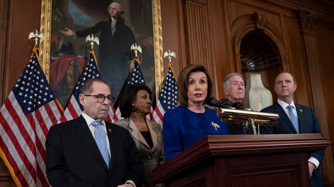 Speaker of the House Nancy Pelosi, D-California, unveils articles of impeachment against President Donald Trump, abuse of power and obstruction of Congress, at the Capitol in Washington, on December 10, 2019. (AP)