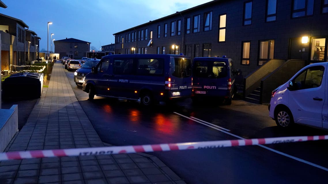Police officers stand at a house in Valby on December 11, 2019 during a police action based on suspicions of preparations of terror attacks with militant Islamist motive.