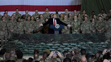 US President Donald Trump speaks to the troops during a surprise Thanksgiving day visit at Bagram Air Field, on November 28, 2019 in Afghanistan. (AFP)