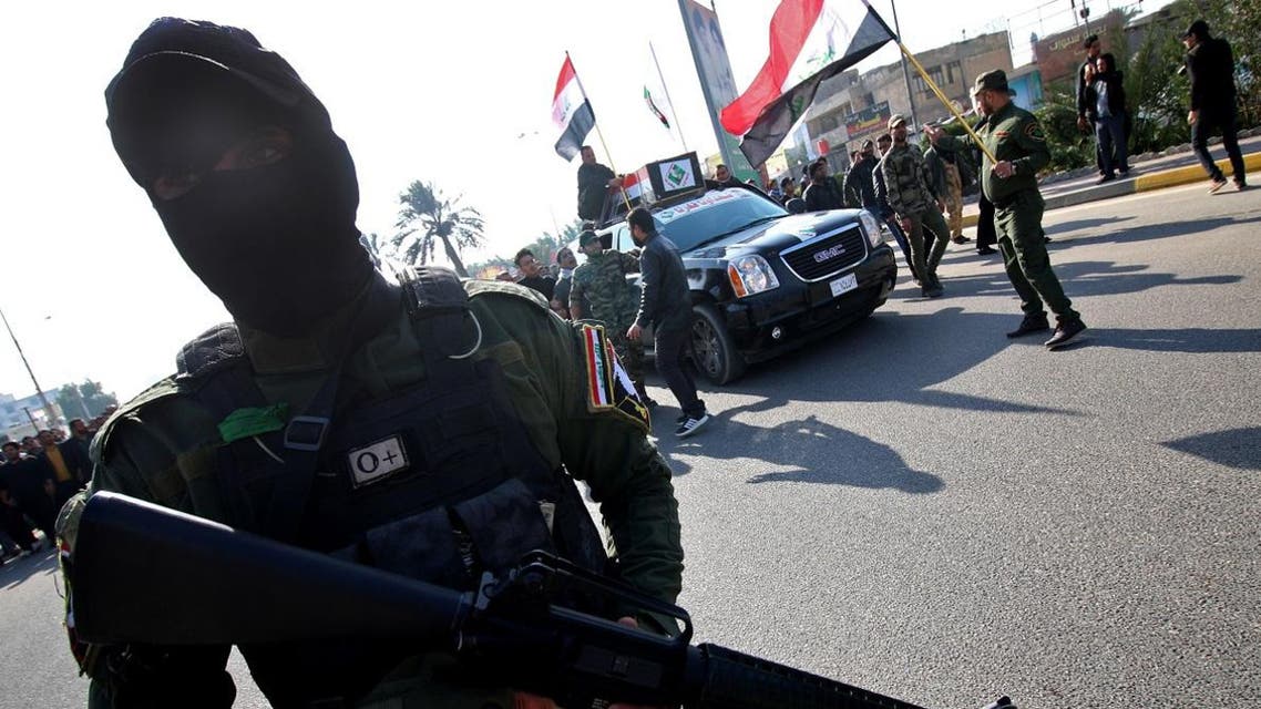 Members of the Saraya al-Salam (Peace Brigades), a group formed by Iraqi Shia cleric Moqtada al-Sadr, pictured during a funeral procession in the northern city of Samarra. (File photo: AFP)