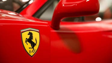 A picture shows the Ferrari logo on a 1990 Ferrari F40 named in the celebration of the company's 40th Birthday. (File photo: AFP)