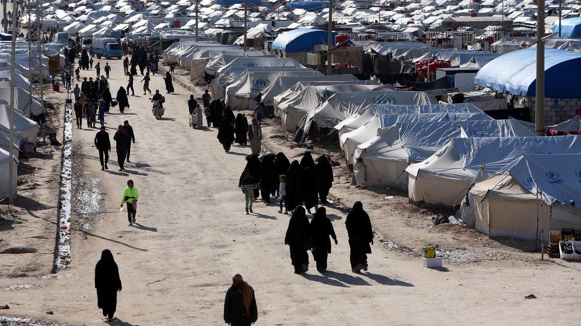 Women walk through al-Hol displacement camp in Hasaka governorate, Syria April 1, 2019. REUTERS