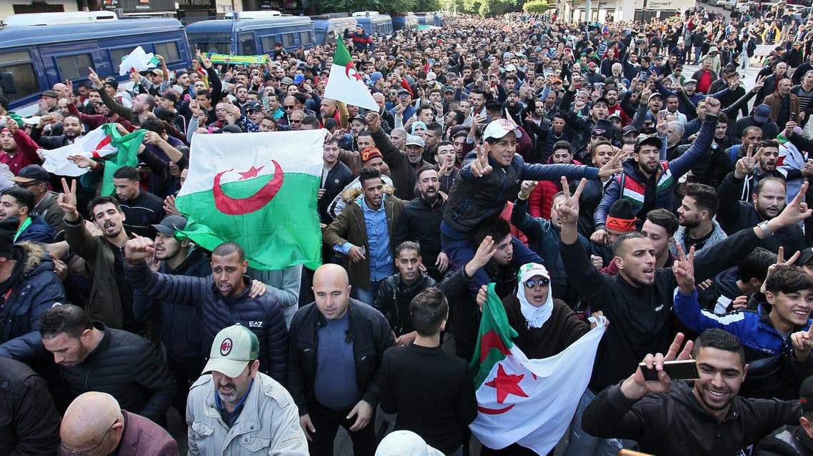 Algerian protesters take part in an anti-government demonstration in the capital Algiers on December 12, 2019 during the presidential election. (AP)