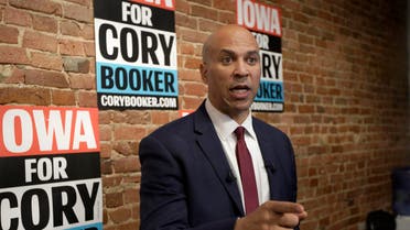 Democratic presidential candidate Sen. Cory Booker, D-N.J. speaks to reporters before speaking at a campaign stop in Council Bluffs, Iowa, Thursday, Dec. 5, 2019. (AP Photo/Nati Harnik)