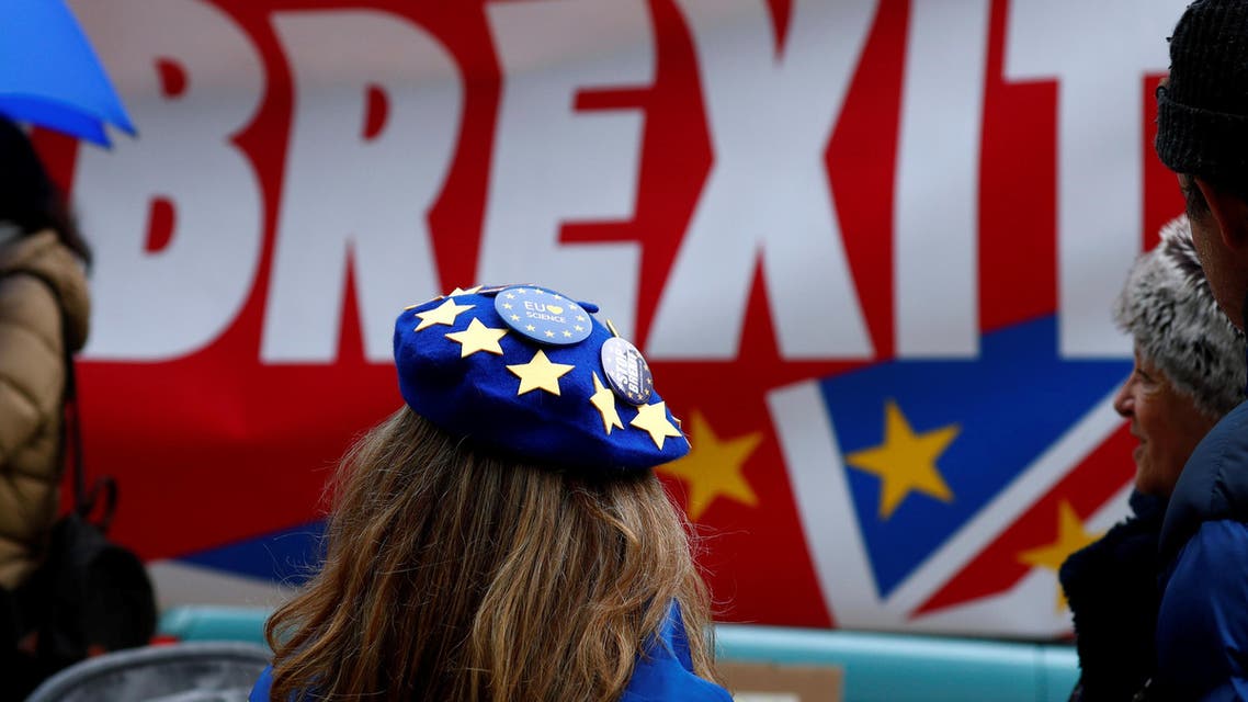 Anti-Brexit badges on a protester's beret are pictured during a demonstration in front of the British embassy in Brussels, Belgium December 5, 2019. REUTERS