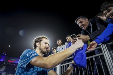 Daniil Medvedev signs autographs after his semi-final win at the Diriyah Tennis Cup. (Supplied)