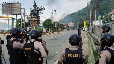 Indonesian security forces take position along a street after hundreds of demonstrators marched near Papua's biggest city Jayapura on August 29, 2019. (File photo: AFP)