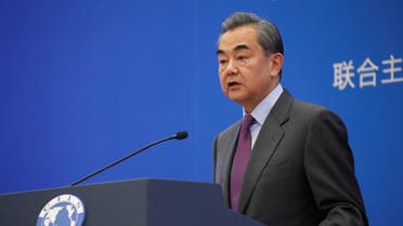 Chinese Foreign Minister Wang Yi delivers a speech at an annual symposium on international situation and China's diplomacy in Beijing. (Reuters)