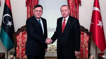 Turkish President Tayyip Erdogan meets with Libya’s internationally recognised Prime Minister Fayez al-Sarraj in Istanbul, Turkey, on November 27, 2019. (Reuters)