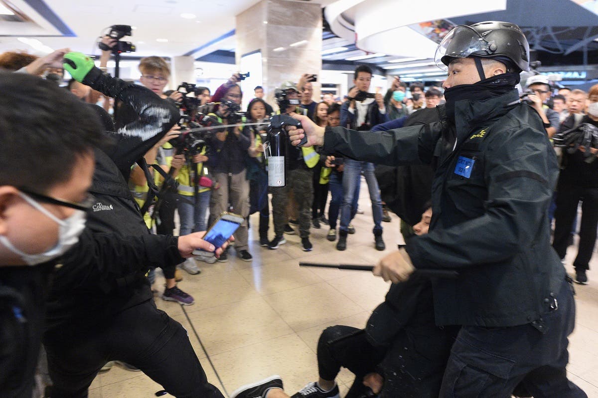 Police deploy pepper spray during a protest at the New Town Plaza shopping mall in Shatin in Hong Kong on December 15, 2019. (File photo: AFP)