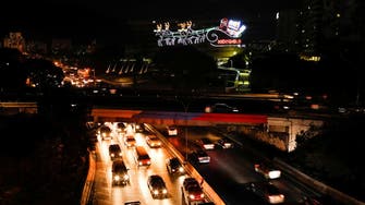 Venezuela Christmas decorations light up anger over blackouts
