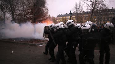 Riot police officers advance during a demonstration in Paris, Thursday, Dec. 5, 2019. (AP)