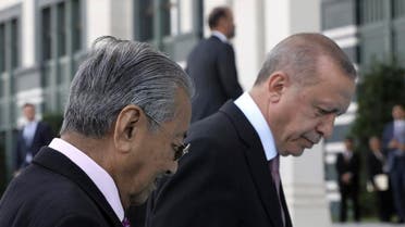 Turkey's President Recep Tayyip Erdogan, right, and Malaysia Prime Minister Mahathir Mohamad walk during a welcome ceremony, in Ankara, Turkey, Thursday, July 25, 2019. (Photo: AP)