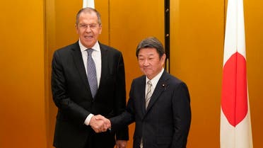 Japanese Foreign Minister Toshimitsu Motegi (R) shakes hands with Russian Foreign Minister Sergey Lavrov at the start of a bilateral meeting ahead the G20 Foreign Ministers' meeting in Nagoya on November 22, 2019. (AFP)