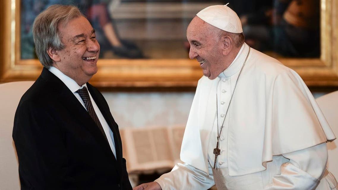 Pope Francis shares a laugh with United Nations Secretary-General Antonio Guterres, (left), on the occasion of their private audience at the Vatican, on December 20, 2019. (AP)