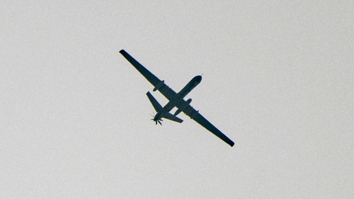 This picture taken on November 22, 2019 shows an unidentified unmanned aerial vehicle (UAV) flying over camps for displaced Syrians in the countryside between Idlib and Aleppo near the Syrian-Turkish border near Jindayris. Rami al SAYED / AFP