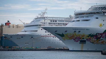 A Norwegian Cruise Line ship and Carnival ship are docked at the port in Nassau, Bahamas. (AFP)
