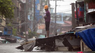 Tropical storm ruins Christmas for thousands of Filipinos