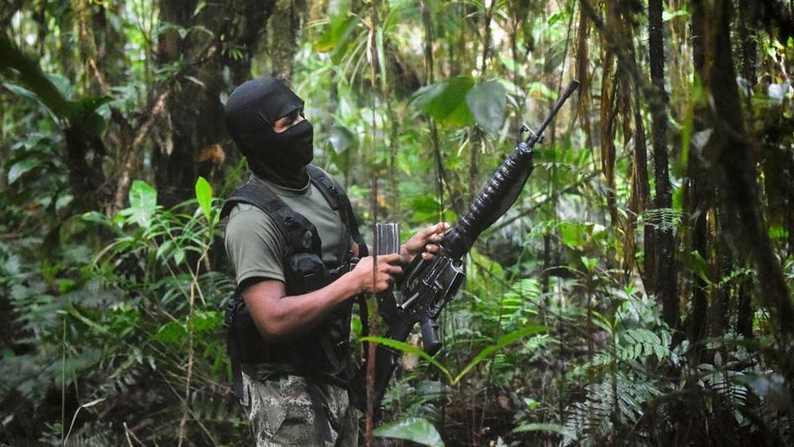 Members of the Ernesto Che Guevara front, belonging to the National Liberation Army (ELN) guerrillas. (AFP)
