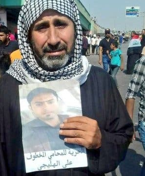 والد علي جاسب حطاب