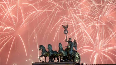 Fireworks light the sky above the Brandenburg Gate shortly after midnight in Berlin. (File photo: AP)