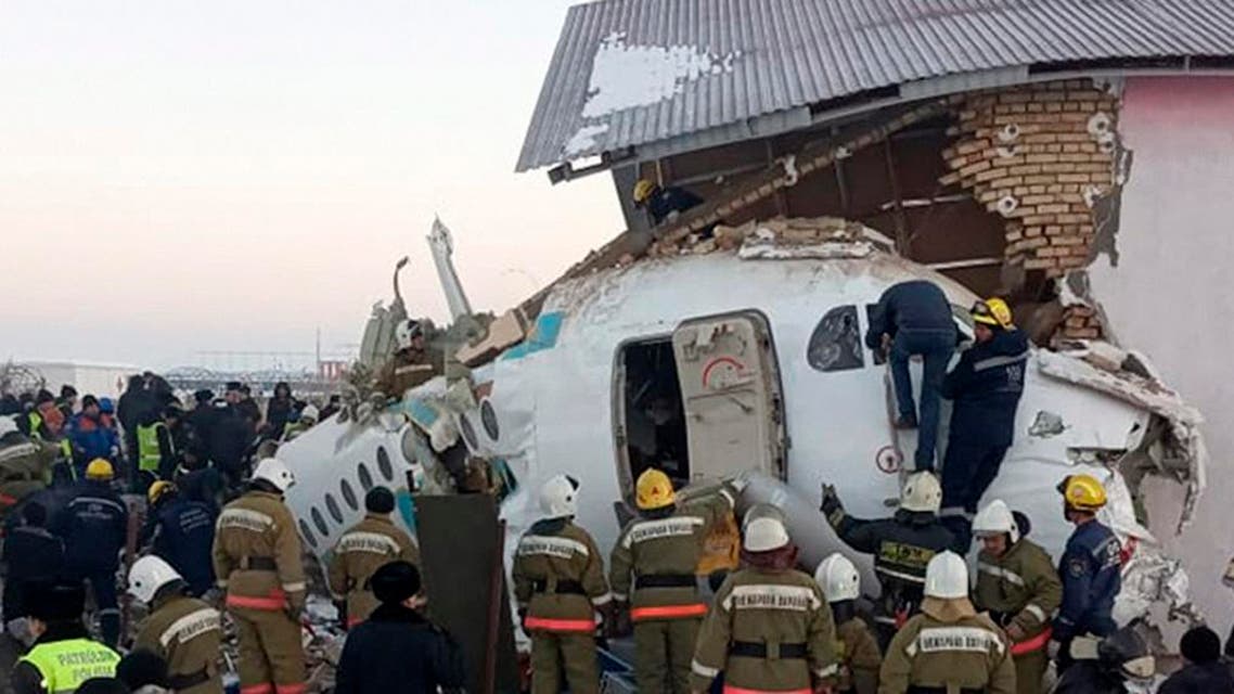 Police and rescuers work on the site of a plane crash near Almaty International Airport, outside Almaty, Kazakhstan, Friday, Dec. 27, 2019. (Photo: AP)