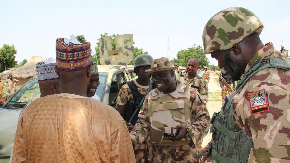 Nigerian soldiers patrol on October 12, 2019, after gunmen suspected of belonging to ISWAP raided the village of Tungushe. (AFP)