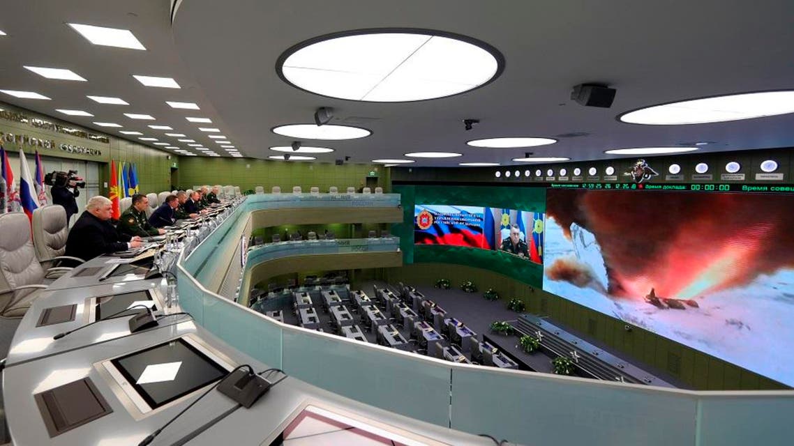Russian top officials oversee the test launch of the Avangard hypersonic glide vehicle from the Defense Ministry’s control room. (AP)