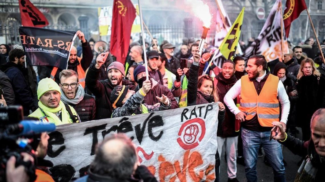 Protesters take part in a demonstration of rail workers and employees of Paris' RATP public transport operator. afp