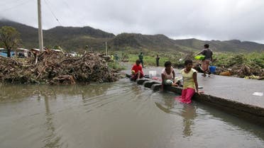People inspect the damage at Nokonoko settlement on February 26, 2016, caused by Cyclone Winston which devastated Fiji. (AFP)