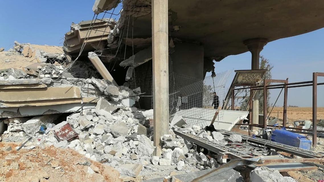 Destroyed headquarters of Kataib Hezbollah militia group are seen after in an air strike in Qaim, Iraq, on December 30, 2019. (Reuters)