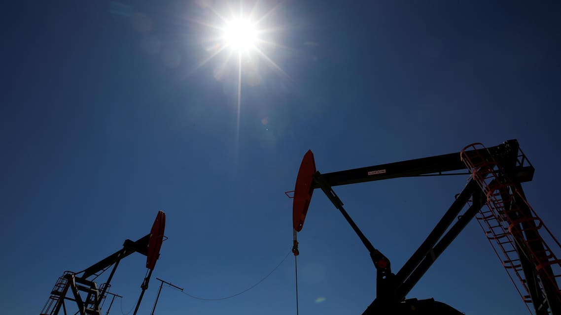 Oil rigs are seen at Vaca Muerta shale oil and gas drilling, in the Patagonian province of Neuquen, Argentina January 21, 2019. Picture taken January 21, 2019. REUTERS/Agustin Marcarian